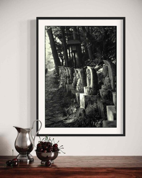 Framed Black & White Zen Garden Statues Photograph Above Rustic Still-Life Arrangement