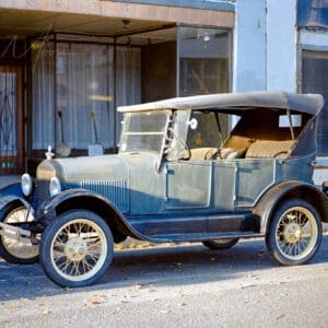 1926 Ford Model T parked on vintage Arizona street in midday sunlight.