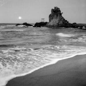 Torii gate fine art print - silver gelatin black and white photo of a Japanese coastal shrine at moonrise with silky waves