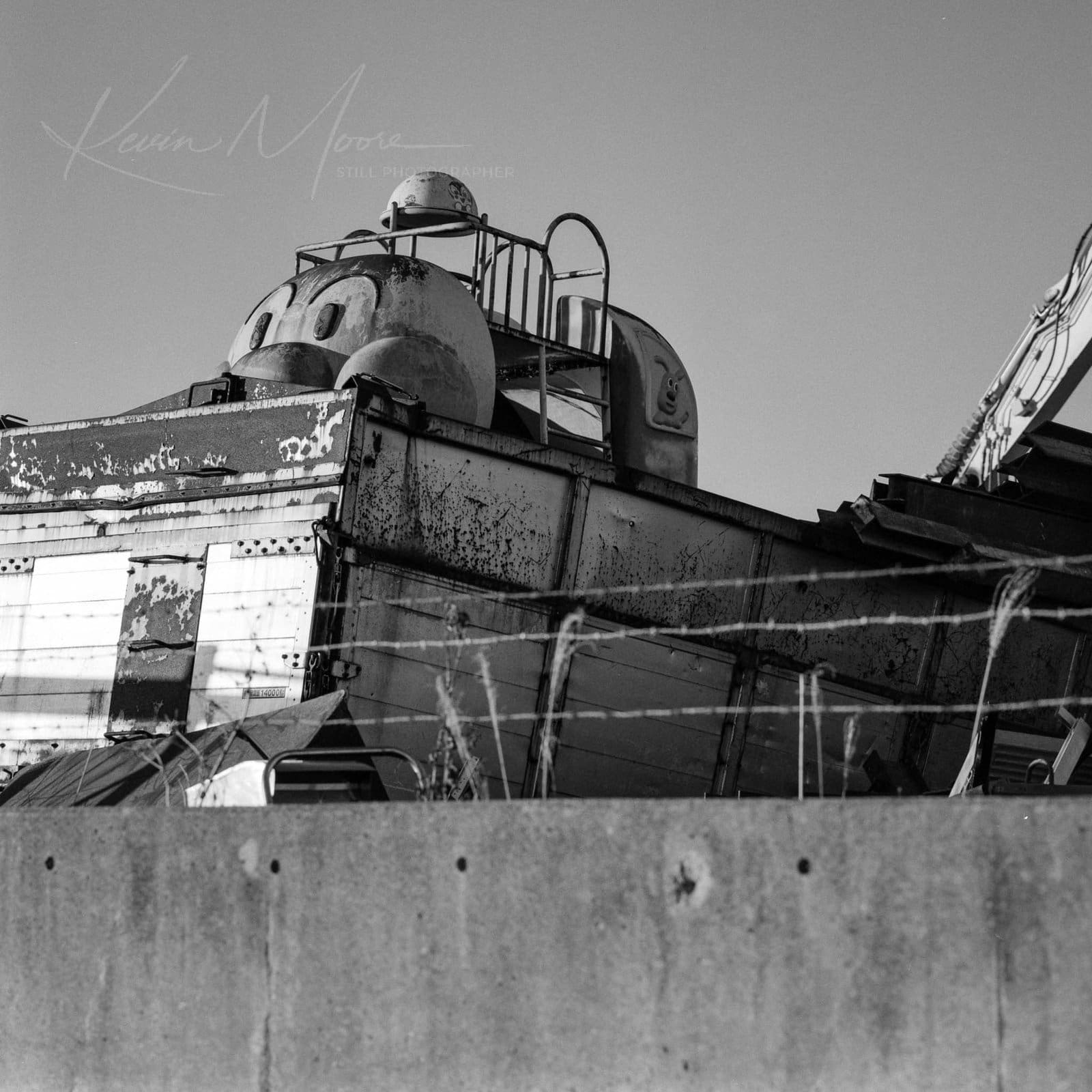 Abandoned Anpanman ride captured on Ilford HP5+ film with a Hasselblad 503cx, representing nostalgic Japan photography.