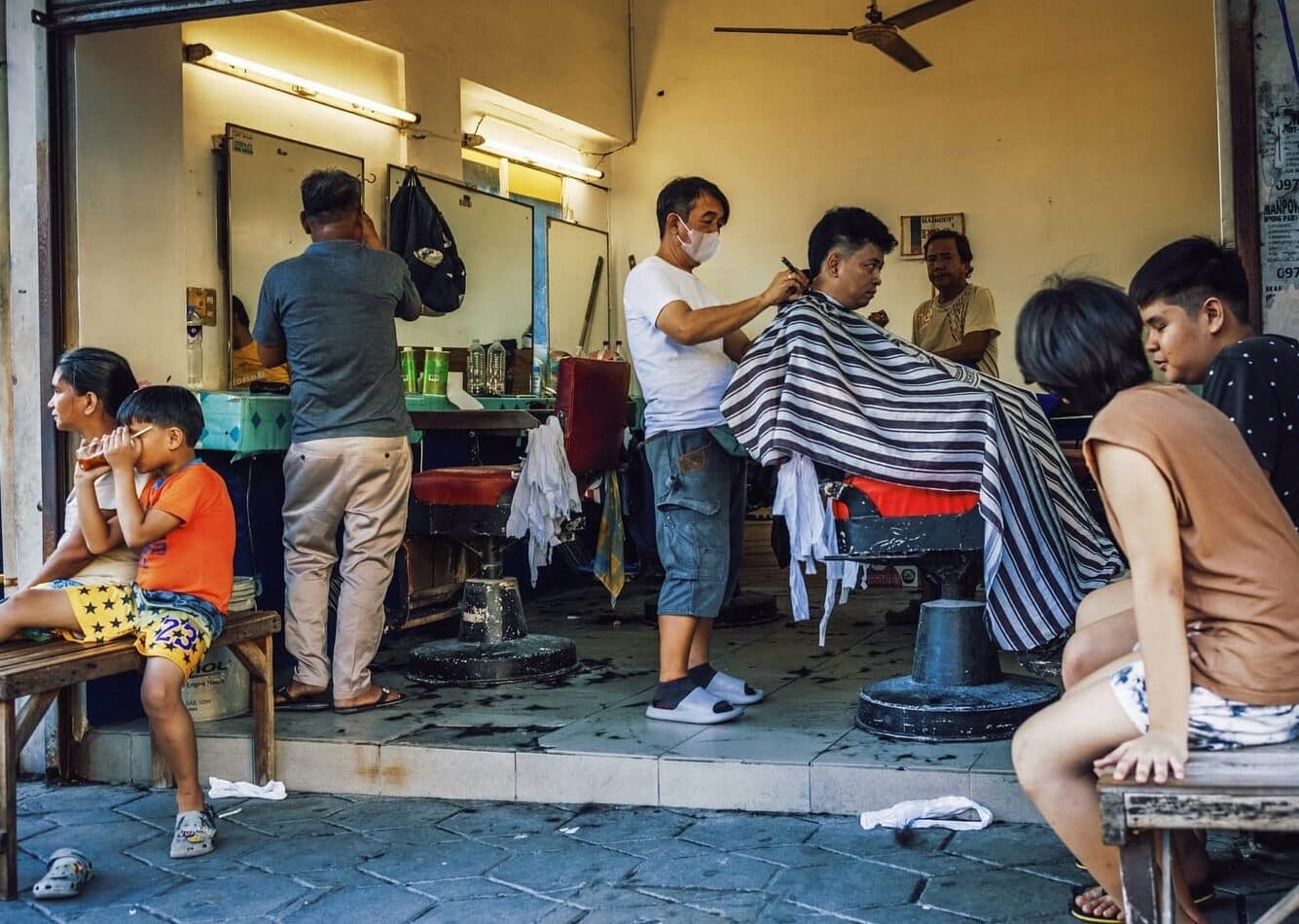 Barbershop Street Photography in the Philippines, captured with a Leica M11