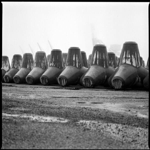 Original square negative of fine art black and white print Idle Line, showing tetrapods in storage at Onahama Port, Japan